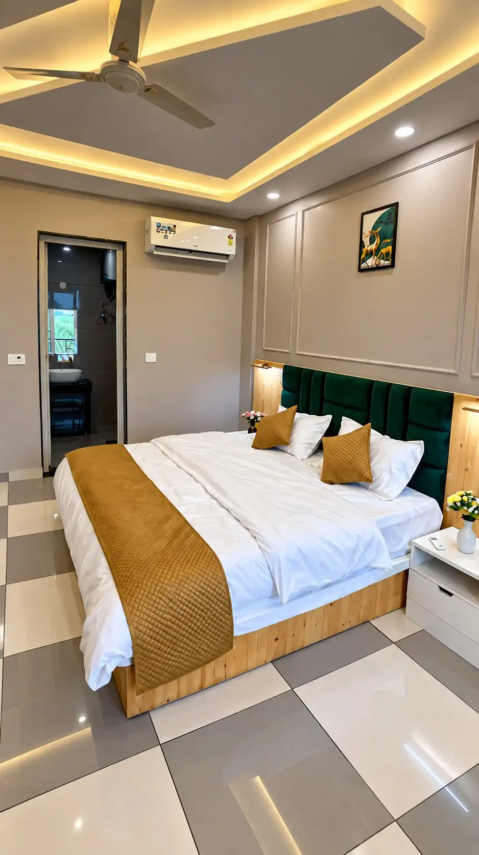 King-size bedroom with balcony door in a Family Suite